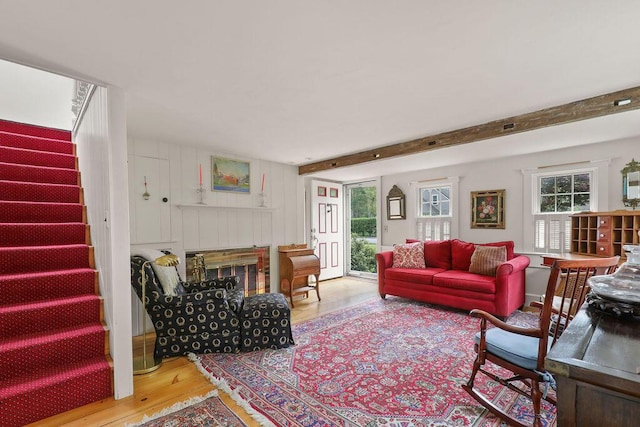 181 Pleasant St, South Yarmouth, MA 02664 - living area featuring wood finished floors, stairway, and beamed ceiling