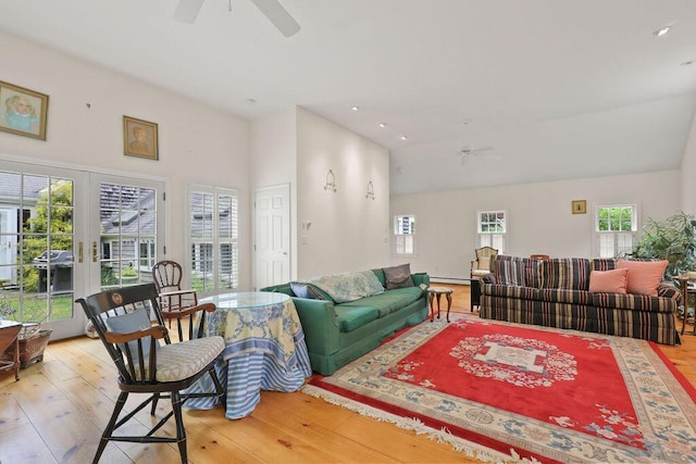 181 Pleasant St, South Yarmouth, MA 02664 - living area with ceiling fan, wood-type flooring, recessed lighting, and a towering ceiling