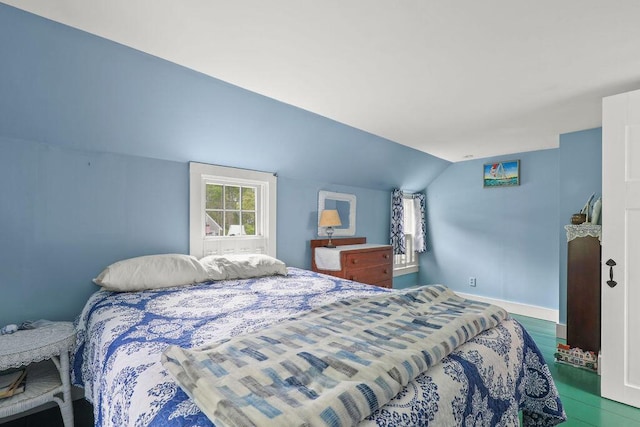 181 Pleasant St, South Yarmouth, MA 02664 - bedroom with lofted ceiling, wood finished floors, and baseboards