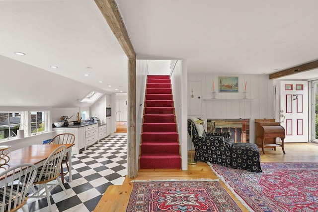 181 Pleasant St, South Yarmouth, MA 02664 - living area with light flooring, stairway, and a fireplace