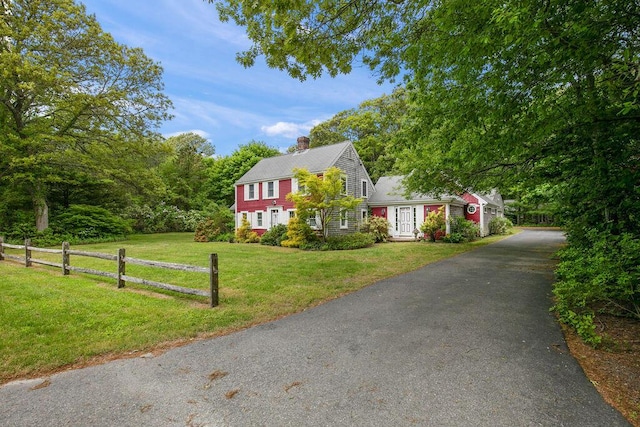 181 Pleasant St, South Yarmouth, MA 02664 - view of front of property with driveway and a chimney
