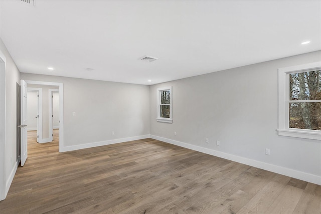 empty room featuring hardwood / wood-style floors