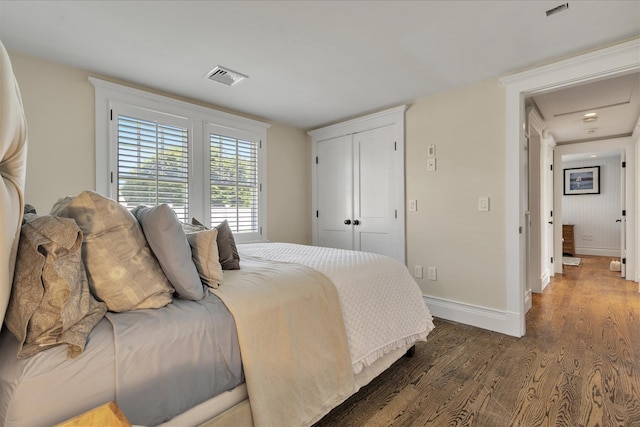 16 Beach View Rd, West Dennis, MA 02670 - bedroom with wood finished floors, baseboards, and a closet