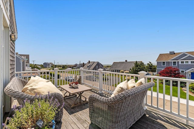 16 Beach View Rd, West Dennis, MA 02670 - wooden deck featuring a residential view