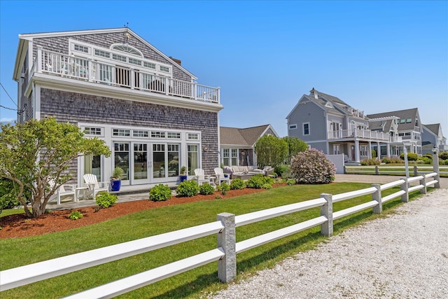 16 Beach View Rd, West Dennis, MA 02670 - rear view of property with a balcony, french doors, and outdoor lounge area