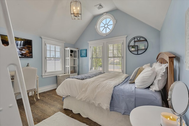 16 Beach View Rd, West Dennis, MA 02670 - bedroom with wood finished floors, vaulted ceiling, and baseboards