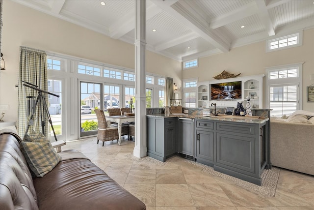 16 Beach View Rd, West Dennis, MA 02670 - kitchen featuring open floor plan, gray cabinetry, beamed ceiling, coffered ceiling, and light stone countertops