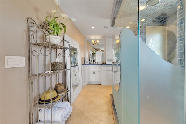 16 Beach View Rd, West Dennis, MA 02670 - bar area with a chandelier, light tile patterned floors, and recessed lighting