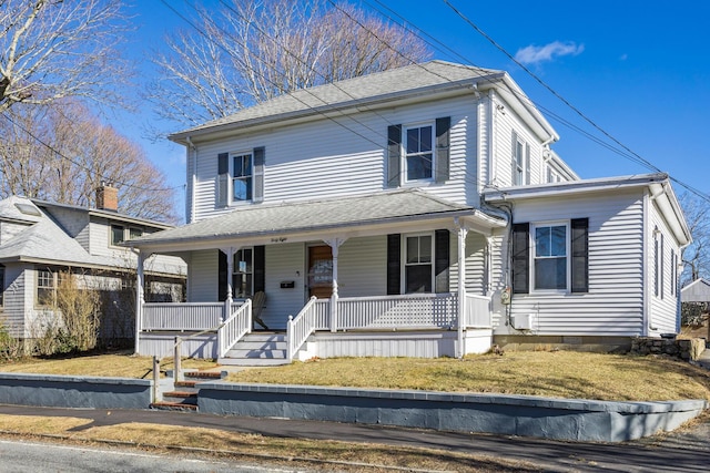 view of front facade with covered porch, a shingled roof, and crawl space