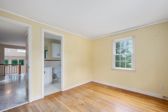272 Sheep Pond Dr, Brewster, MA 02631 - spare room featuring light wood-style floors, crown molding, and baseboards