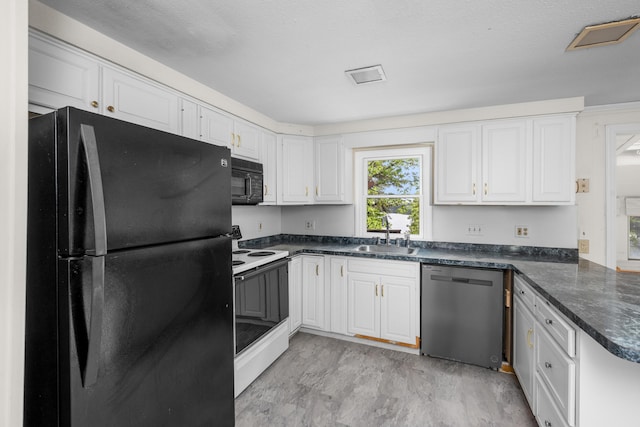 272 Sheep Pond Dr, Brewster, MA 02631 - kitchen with black appliances, a sink, and white cabinetry