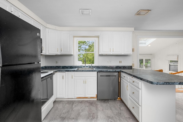 272 Sheep Pond Dr, Brewster, MA 02631 - kitchen with freestanding refrigerator, dishwasher, a peninsula, a sink, and dark countertops