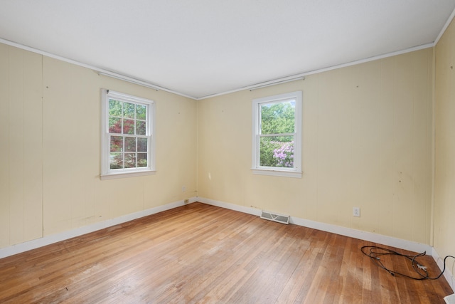 272 Sheep Pond Dr, Brewster, MA 02631 - spare room featuring light wood-style flooring, plenty of natural light, baseboards, and crown molding