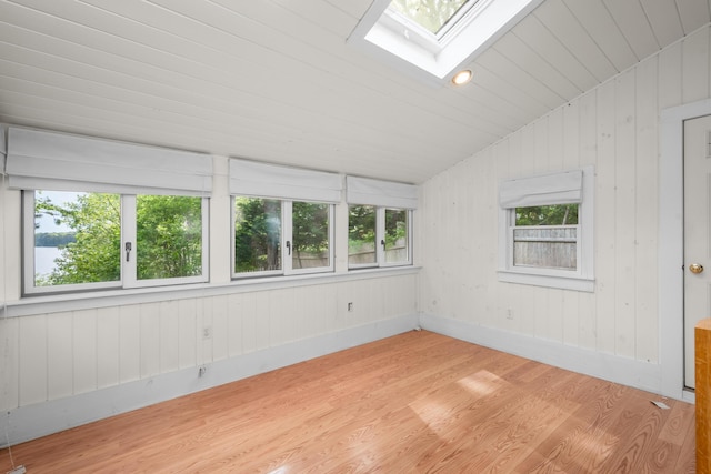 272 Sheep Pond Dr, Brewster, MA 02631 - empty room with a skylight, light wood-type flooring, lofted ceiling, and wooden ceiling