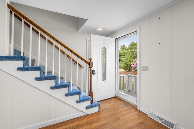 272 Sheep Pond Dr, Brewster, MA 02631 - foyer entrance with light wood finished floors and stairs