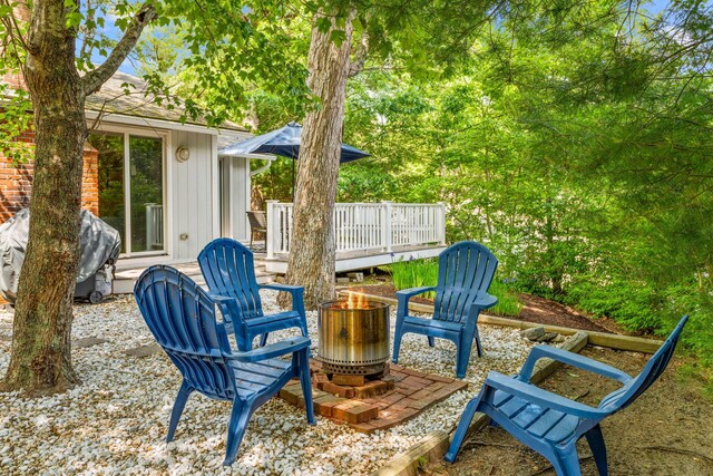 12 Running Light Way, Mashpee, MA 02649 - view of patio / terrace featuring an outdoor fire pit, a grill, and a wooden deck