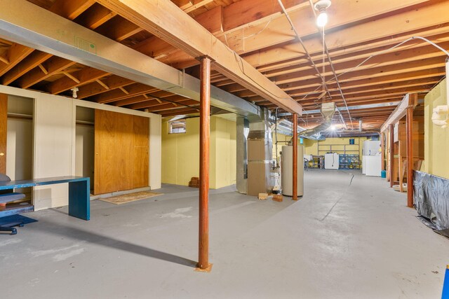12 Running Light Way, Mashpee, MA 02649 - unfinished below grade area featuring water heater and heating unit