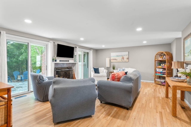12 Running Light Way, Mashpee, MA 02649 - living area with a fireplace, light wood-type flooring, recessed lighting, and baseboards