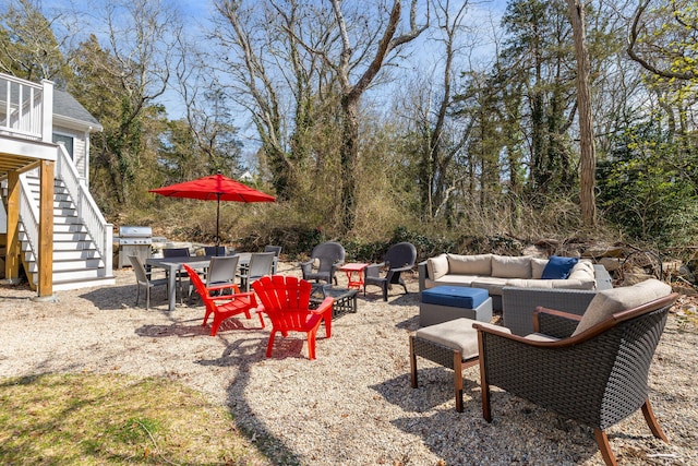 4 Charles Ln, Falmouth, MA 02540 - view of patio with stairs, a grill, and an outdoor hangout area