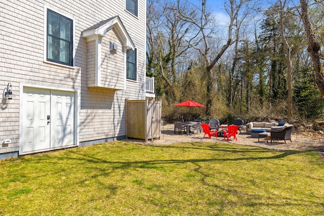 4 Charles Ln, Falmouth, MA 02540 - view of green lawn featuring an outdoor living space and a patio area