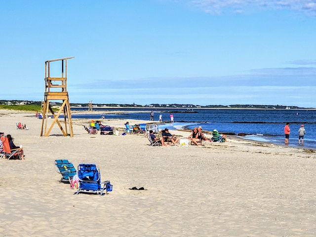 property view of water featuring a beach view