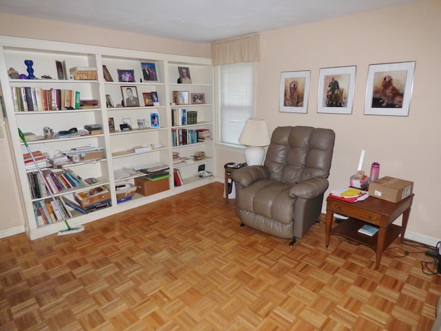 sitting room with parquet floors