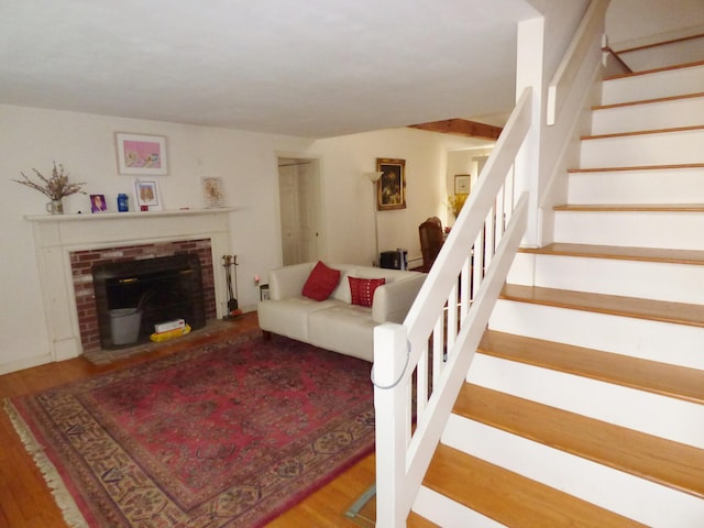 living room featuring hardwood / wood-style floors and a fireplace