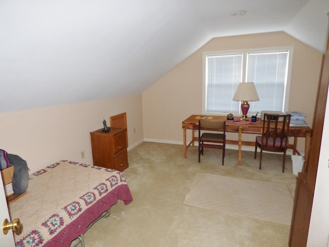 carpeted bedroom featuring vaulted ceiling