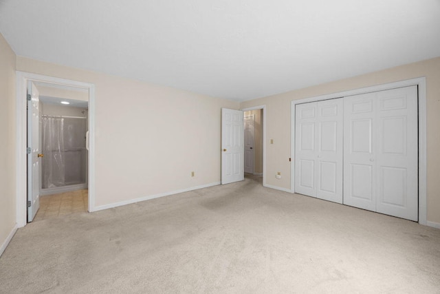 2 Englewood Dr Unit H-1, Harwich, MA 02645 - unfurnished bedroom featuring carpet floors, a closet, and ensuite bath