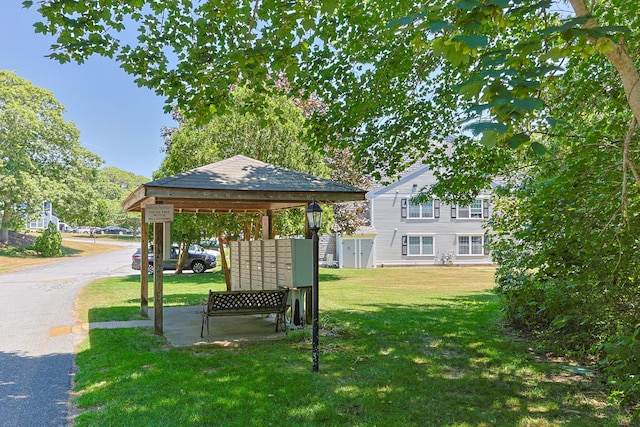 2 Englewood Dr Unit H-1, Harwich, MA 02645 - view of home's community featuring mail area and a lawn