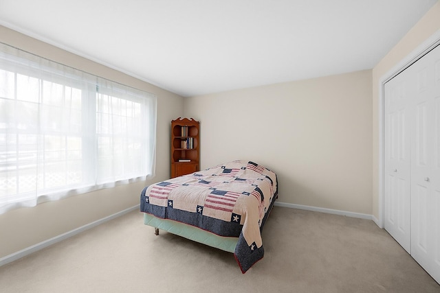 2 Englewood Dr Unit H-1, Harwich, MA 02645 - bedroom with carpet and a closet