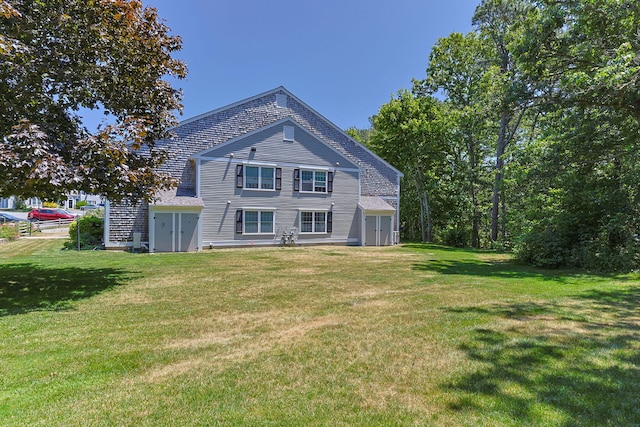 2 Englewood Dr Unit H-1, Harwich, MA 02645 - rear view of property with a yard
