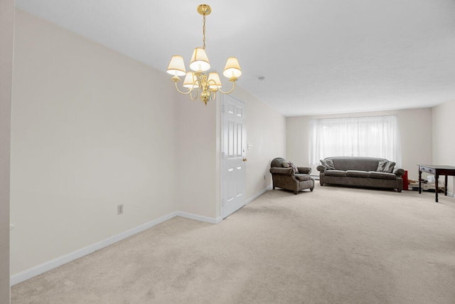 2 Englewood Dr Unit H-1, Harwich, MA 02645 - living area with carpet floors and a chandelier
