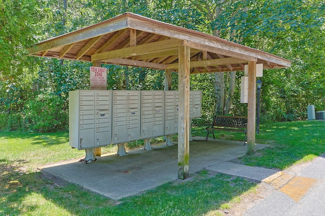 2 Englewood Dr Unit H-1, Harwich, MA 02645 - surrounding community with mail area, a carport, and a lawn