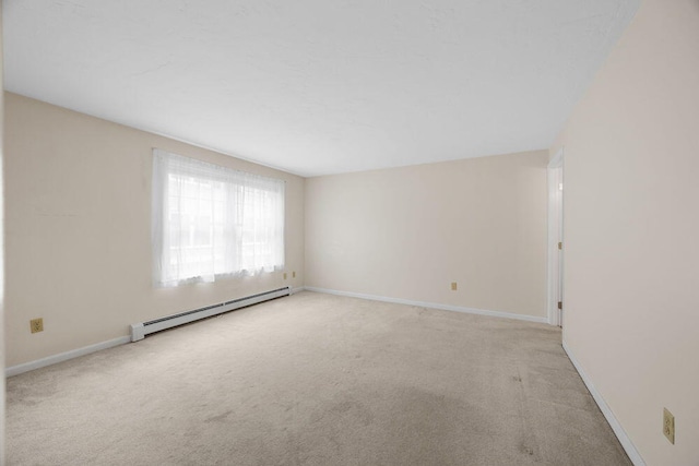 2 Englewood Dr Unit H-1, Harwich, MA 02645 - unfurnished room with baseboard heating and light carpet