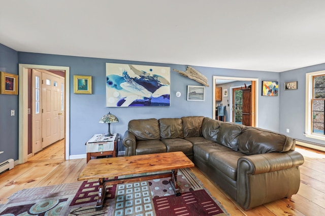 living room with light hardwood / wood-style floors