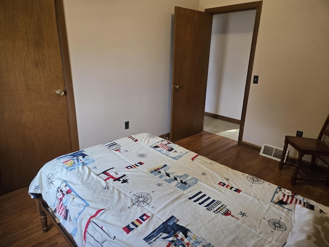 57 Cedar Hill Rd, Brewster, MA 02631 - bedroom with wood finished floors and baseboards