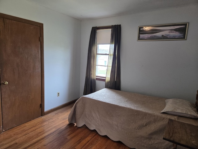 57 Cedar Hill Rd, Brewster, MA 02631 - bedroom featuring wood finished floors and baseboards