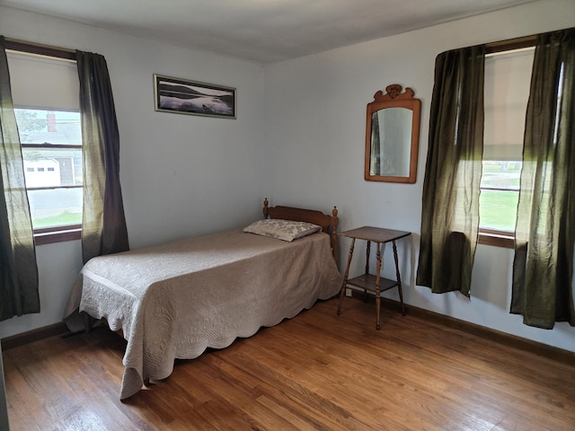 57 Cedar Hill Rd, Brewster, MA 02631 - bedroom with wood finished floors and baseboards