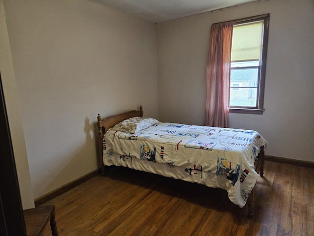 57 Cedar Hill Rd, Brewster, MA 02631 - bedroom with wood finished floors and baseboards