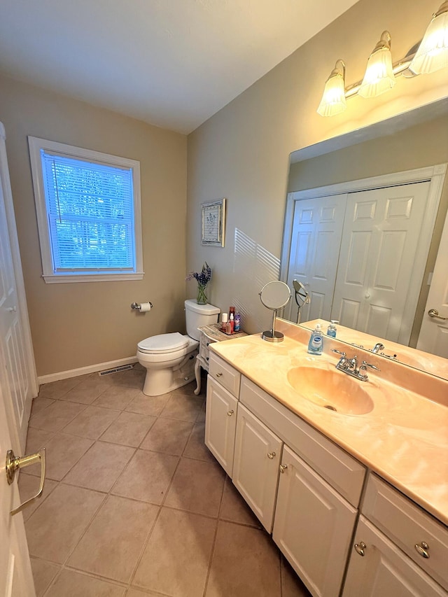 13 Quail Hollow Cir, Sandwich, MA 02563 - bathroom with tile patterned floors, vanity, toilet, and baseboards