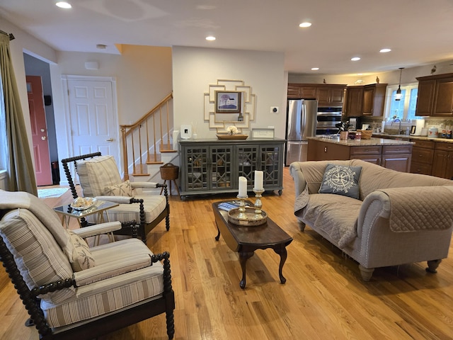 13 Quail Hollow Cir, Sandwich, MA 02563 - living area with stairway, light wood-style floors, and recessed lighting