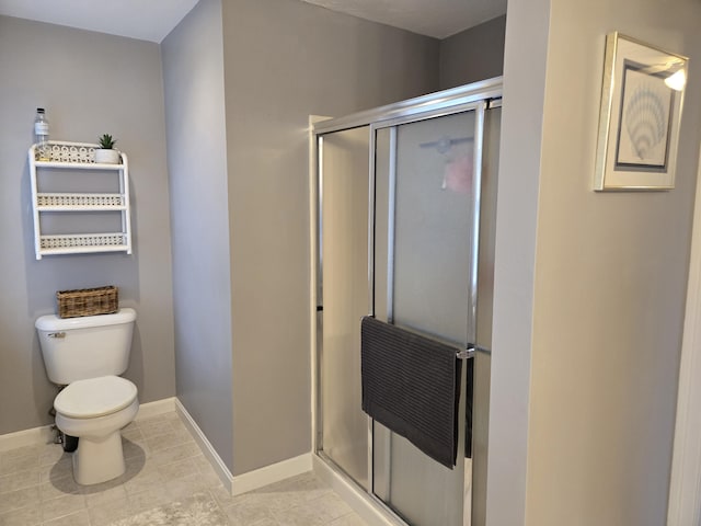 13 Quail Hollow Cir, Sandwich, MA 02563 - full bath with toilet, baseboards, a stall shower, and tile patterned floors