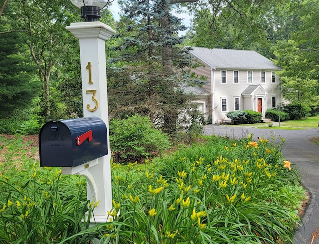 13 Quail Hollow Cir, Sandwich, MA 02563 - exterior view of asphalt driveway