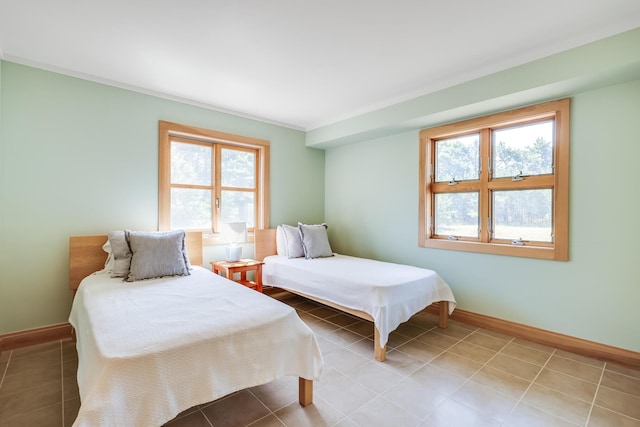 tiled bedroom with crown molding