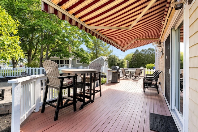44 Buttermilk Way, Buzzards Bay, MA 02532 - wooden deck featuring outdoor dining space and a grill