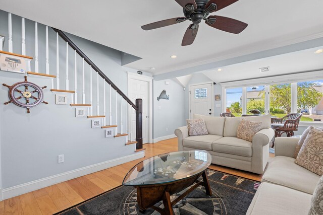 44 Buttermilk Way, Buzzards Bay, MA 02532 - living area featuring plenty of natural light, baseboards, wood finished floors, and stairs