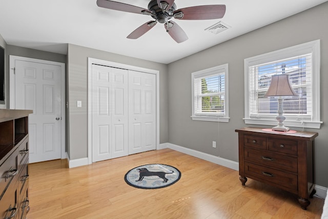44 Buttermilk Way, Buzzards Bay, MA 02532 - bedroom featuring light wood-type flooring, baseboards, a closet, and ceiling fan