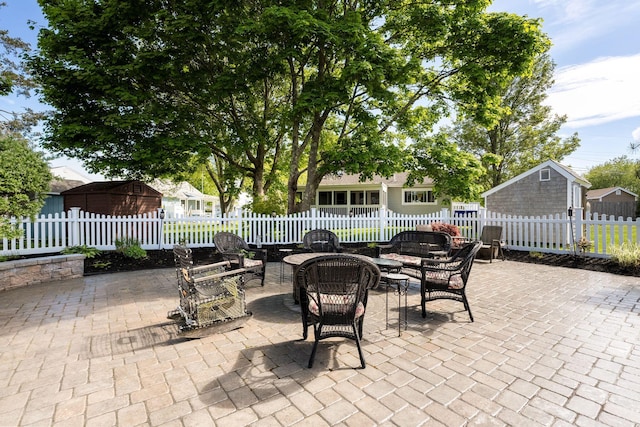 44 Buttermilk Way, Buzzards Bay, MA 02532 - view of patio / terrace featuring an outdoor fire pit