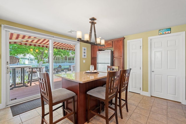 44 Buttermilk Way, Buzzards Bay, MA 02532 - dining area with baseboards and a chandelier